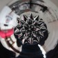 Ferrofluid in a petri dish with a magnet below